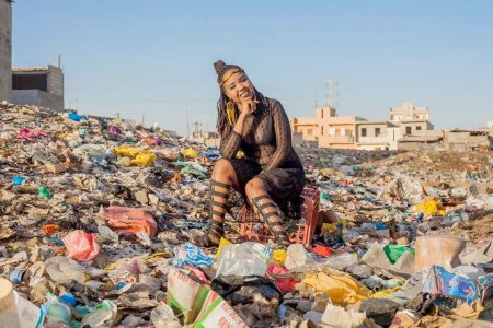 sitting on a pile of trash.jpg